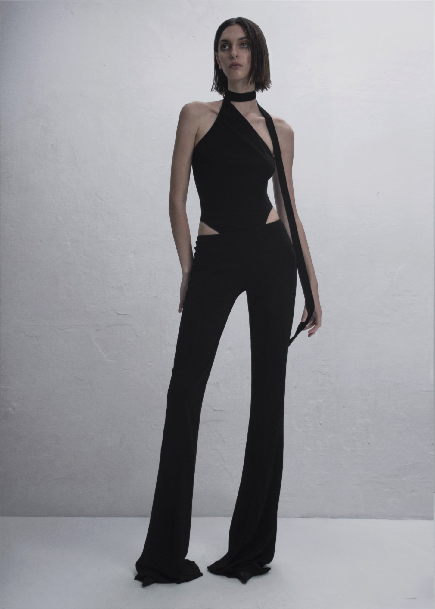 GUDU ONE-SHOULDER BODYSUIT WITH AN OPEN BACK